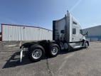 Exterior rear passenger side for this 2023 Kenworth T680 (Stock number: UPJ231782)