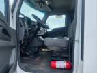 Drivers side door open for this 2023 Kenworth T280 (Stock number: UPM252172)