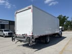 Exterior rear passenger side for this 2024 Kenworth T280 (Stock number: URM337029)