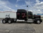 Exterior full passenger side for this 2024 Kenworth W900L (Stock number: URR336416)