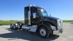 Exterior front passenger side for this 2021 Kenworth T880 (Stock number: UMJ445523)