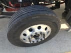 Driver side front tire tread for this 2024 Kenworth T880 (Stock number: RF353068)