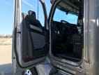 Drivers side door open for this 2024 Kenworth T880 (Stock number: RF353068)