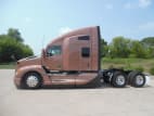 Exterior full driver side for this 2024 Kenworth T680 (Stock number: RJ343493)