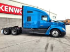 Exterior full passenger side for this 2024 Kenworth T680 (Stock number: RJ350666)