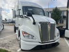 Exterior front passenger side for this 2024 Kenworth T680 (Stock number: RJ352782)