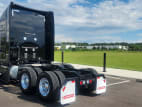 Exterior rear driver side for this 2024 Kenworth T680 (Stock number: RJ354218)