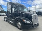 Exterior front passenger side for this 2024 Kenworth T680 (Stock number: RJ354223)