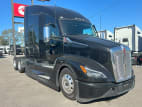 Exterior front passenger side for this 2024 Kenworth T680 (Stock number: RJ354231)