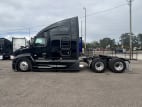 Exterior full driver side for this 2024 Kenworth T680 (Stock number: RJ354232)