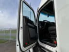 Drivers side door open for this 2024 Kenworth T680 (Stock number: RJ359368)