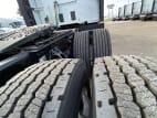 Passenger side rear frame and tire tread for this 2024 Kenworth T680 (Stock number: RJ359370)