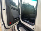 Drivers side door open for this 2024 Kenworth T680 (Stock number: RJ370588)