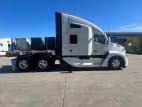 Exterior full passenger side for this 2024 Kenworth T680 (Stock number: RJ372638)