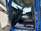 Drivers side door open for this 2024 Kenworth T880 (Stock number: RJ387016)