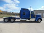 Exterior full passenger side for this 2024 Kenworth W900L (Stock number: RR353372)