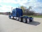 Exterior rear driver side for this 2024 Kenworth W900L (Stock number: RR353372)