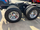 Passenger side rear frame and tire tread for this 2025 Kenworth T680 (Stock number: SJ129201)