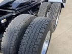 Passenger side rear frame and tire tread for this 2025 Kenworth T880 (Stock number: SJ129728)