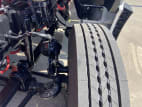 Driver side front tire tread for this 2025 Kenworth T880 (Stock number: SJ131572)