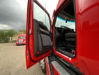 Drivers side door open for this 2025 Kenworth T680 (Stock number: SJ131597)