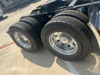 Passenger side rear frame and tire tread for this 2025 Kenworth T880 (Stock number: SJ131725)