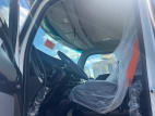 Drivers side door open for this 2025 Kenworth T880 Short Hood (Stock number: SJ131745)