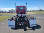 Exterior full rear view for this 2025 Kenworth T880 (Stock number: SJ140910)