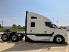 Exterior full passenger side for this 2025 Kenworth T680 (Stock number: SJ165052)