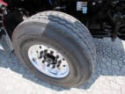 Driver side front tire tread for this 2025 Kenworth T880 Short Hood (Stock number: SJ173927)