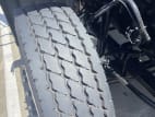 Passenger side front tire tread for this 2025 Mack Granite GR64 (Stock number: SM047404)