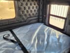 Interior driver side sleeper for this 2025 Kenworth W900L (Stock number: SR133191)