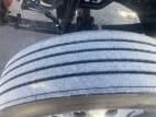 Driver side front tire tread for this 2025 Kenworth W900L (Stock number: SR154456)