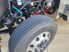 Driver side front tire tread for this 2025 Kenworth W900L (Stock number: SR177260)