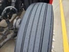 Driver side front tire tread for this 2015 Freightliner Cascadia (Stock number: UFSGF2155)