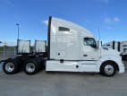 Exterior full passenger side for this 2021 Kenworth T680 (Stock number: UMJ434821)