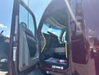 Drivers side door open for this 2021 Kenworth T680 Short Hood (Stock number: UMJ436568)