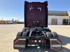 Exterior full rear view for this 2021 Kenworth T680 Short Hood (Stock number: UMJ436573)