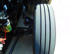 Driver side front tire tread for this 2021 Kenworth T680 Short Hood (Stock number: UMJ436586)