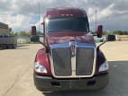 Exterior full front view for this 2021 Kenworth T680 Short Hood (Stock number: UMJ436610)