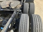 Passenger side rear frame and tire tread for this 2021 Kenworth T680 Short Hood (Stock number: UMJ436610)