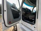 Drivers side door open for this 2022 Kenworth T680 (Stock number: UNJ487090)