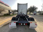 Exterior full rear view for this 2022 Kenworth T680 (Stock number: UNJ487090)