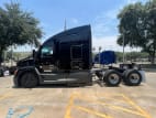 Exterior full driver side for this 2023 Kenworth T680 (Stock number: UPJ236845)