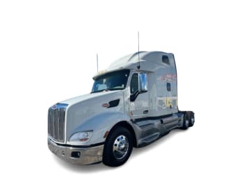 Featured image with white background for this 2022 Peterbilt 579 (Stock number: UND759972)