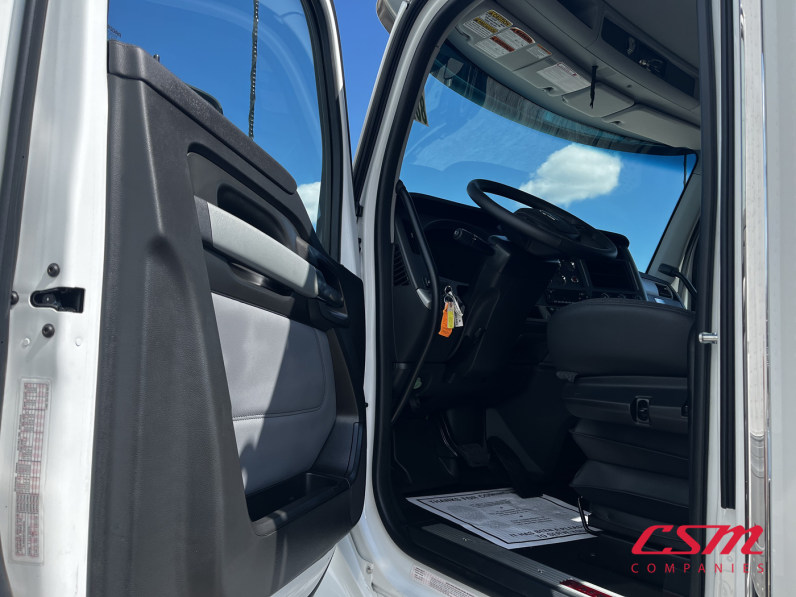 Drivers side door open for this 2026 Kenworth T880 (Stock number: TJ230038)