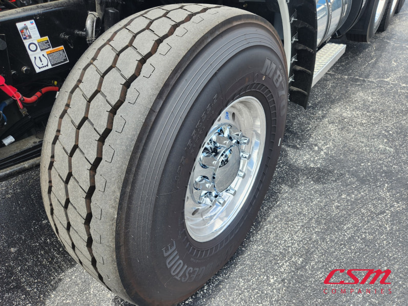 Driver side front tire tread for this 2026 Kenworth T880 (Stock number: TJ230001)