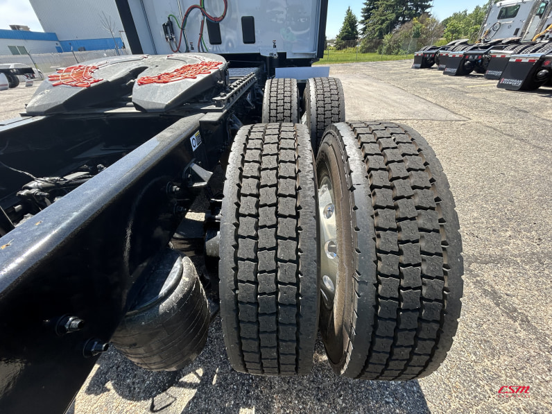 Passenger side rear frame and tire tread for this 2027 Kenworth T680 Short Hood (Stock number: VJ250501)