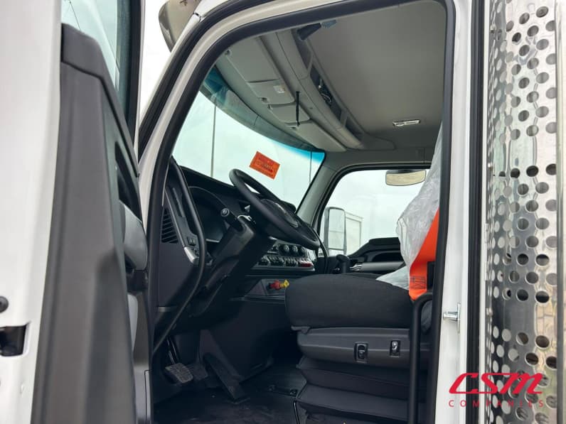 Drivers side door open for this 2026 Kenworth T880 (Stock number: TJ216007)