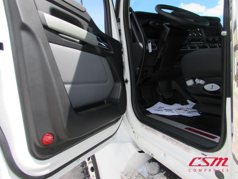 Drivers side door open for this 2027 Kenworth T880 (Stock number: VJ249787)